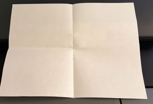 Fold paper into quarters