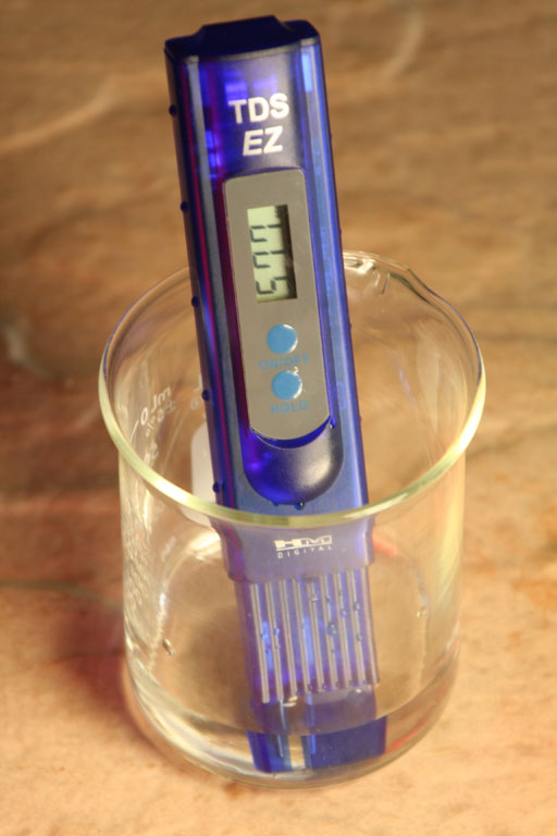 TDS meter in beaker