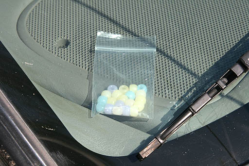 UV beads behind windshield