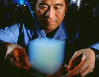 Man holding cube of aerogel