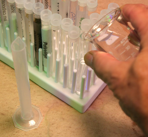 Filling test tube with water