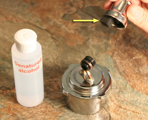 Metal cap removed from alcohol burner