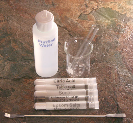 purified water and 5 test tubes with items to test