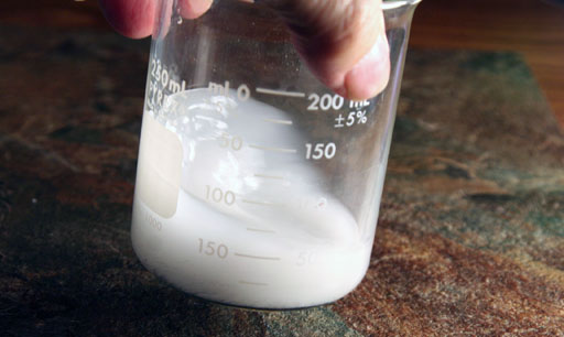 swirl water to suspend calcium carbonate
