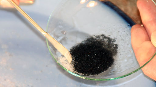 rake white sand off of watch glass