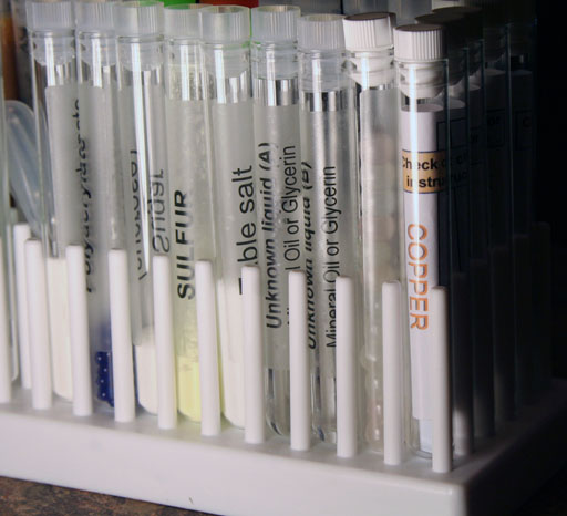 copper test strips in test tube tray