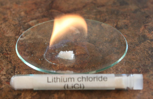Alcohol burning around lithium choride powder sitting in watch glass