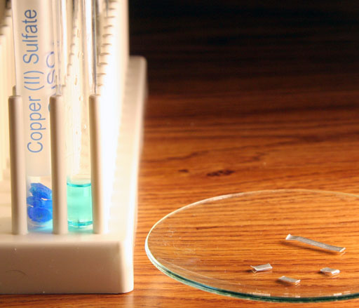 copper sulfate dissolved. Magnesium pieces near by