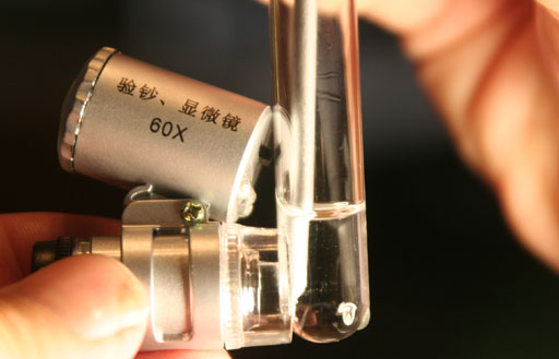 microscope looking at zinc in acid
