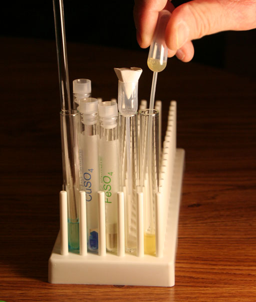 Transfer iron sulfate solution to filter