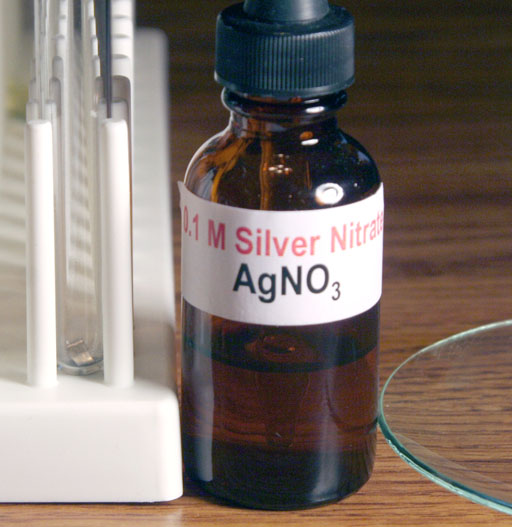 silver nitrate bottle and magnesium piece in test tube