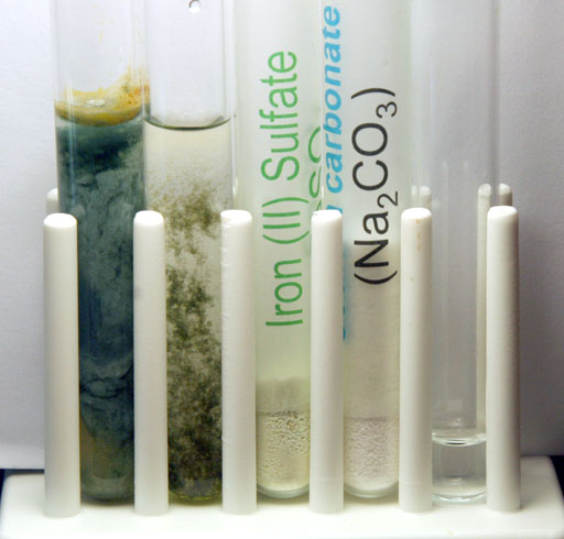 iron carbonate precipitates from weak and strong