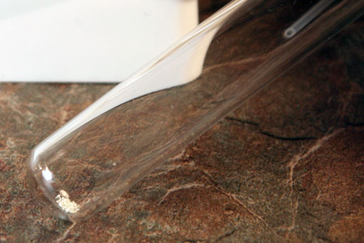 small amount of iron sulfate in test tube