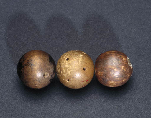 These are the actual wood spheres that Dalton used as models for atoms.