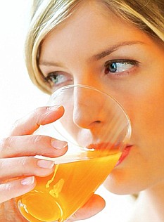 drinking orange juice