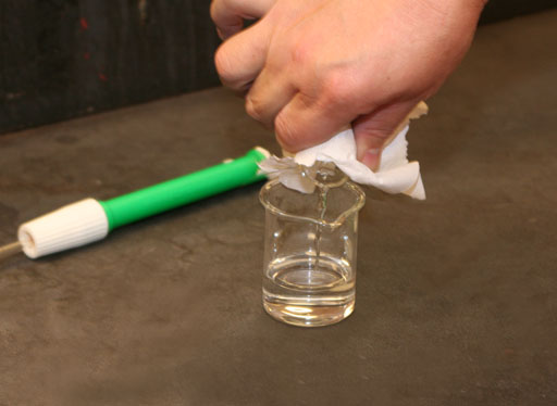 pour unknown back in flask