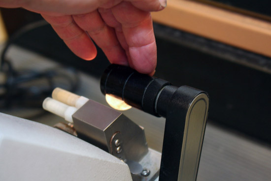 adjust light on refractometer