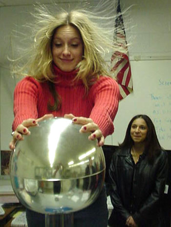 static electricity girl with hair standing up